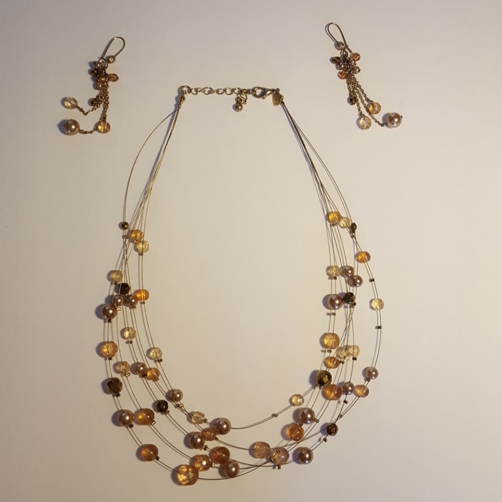 Gold colored beaded necklace and earring set